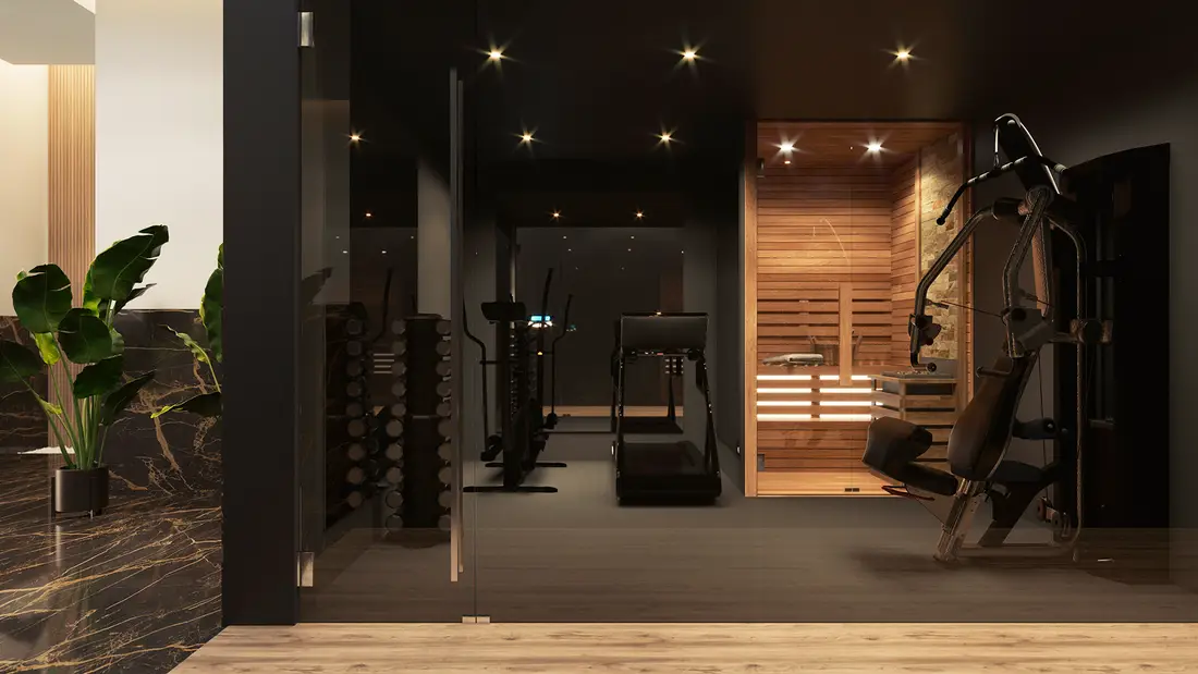 The residents' gym at Rodas Playa, with the glass-fronted sauna at the back