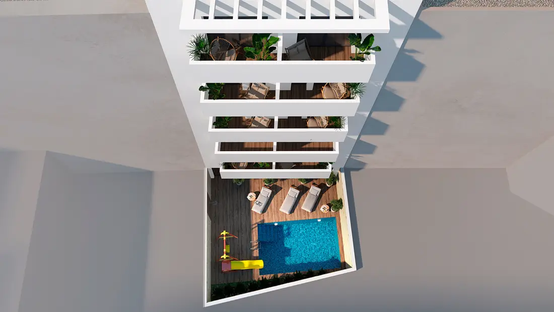 The ground-floor patio at Rodas Playa from above: the 3 × 5 m pool, timber deck, loungers and the children's zone