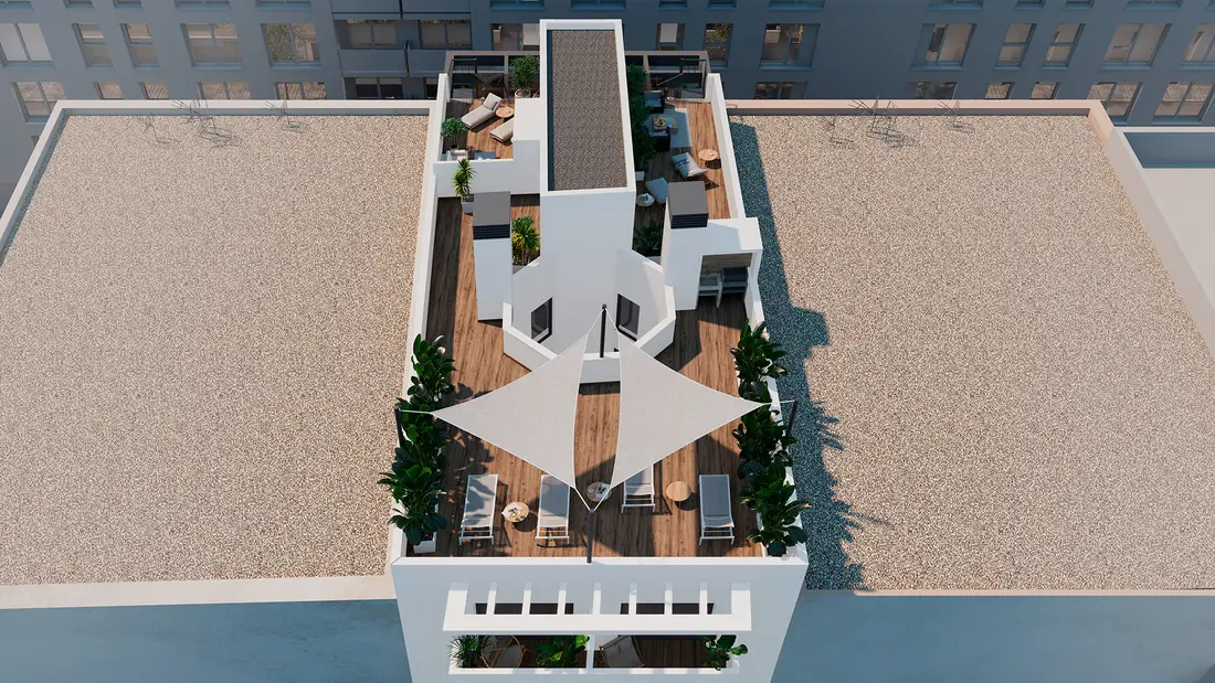 Aerial view of the Rodas Playa roof: the community solarium with shade sails and loungers at the street end, the two private penthouse solariums behind